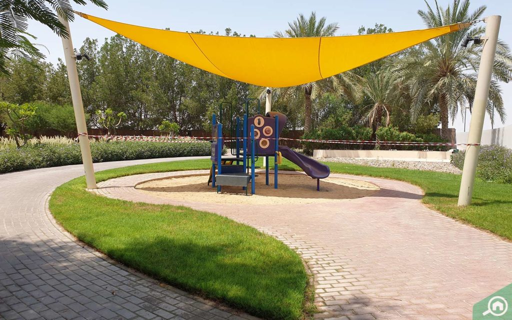 Outdoor kids play area in Al Thamam 43