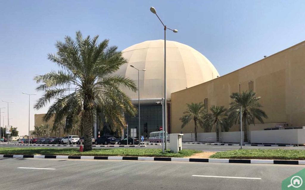 Dubai Outlet Mall located near The Blue Oasis