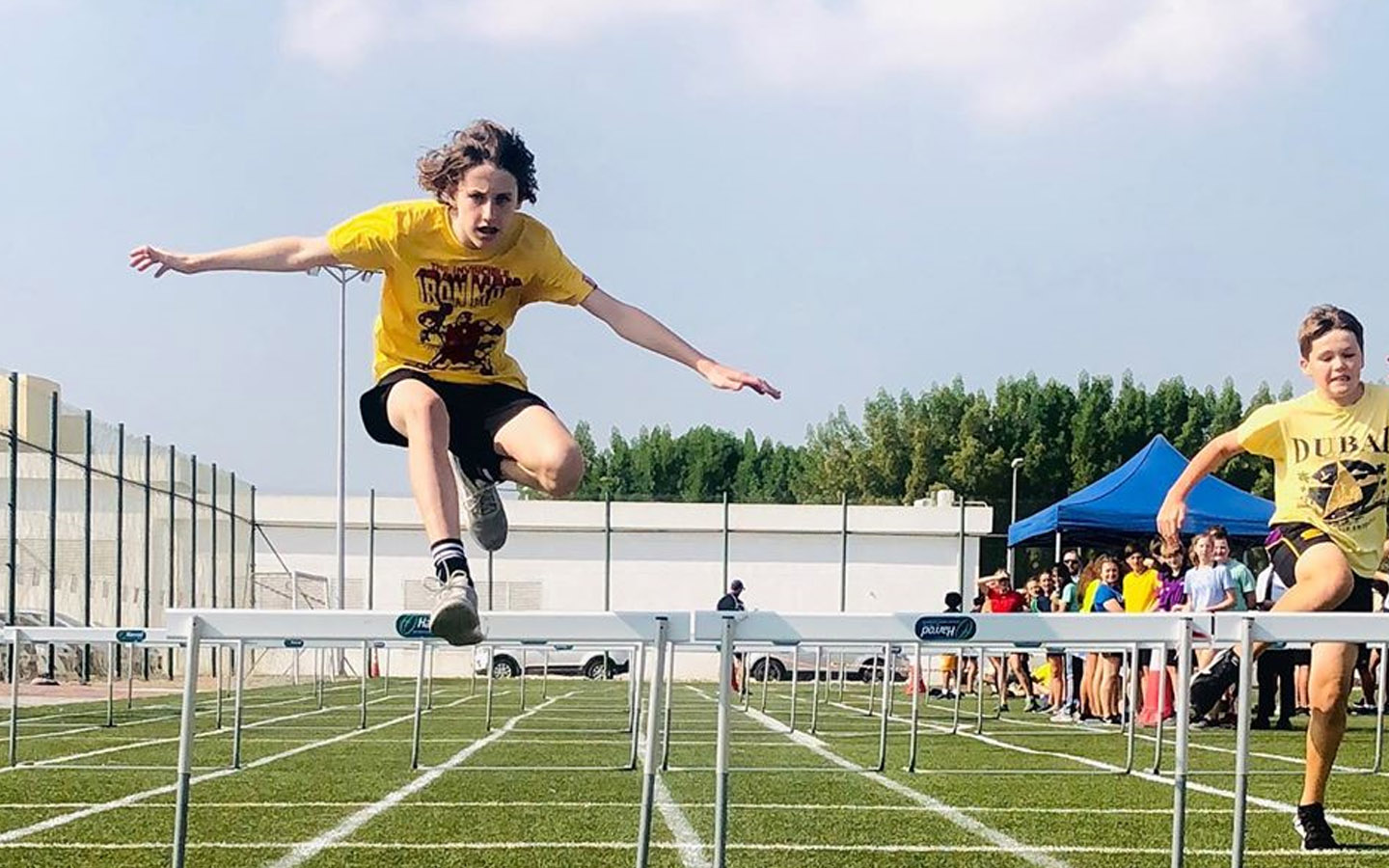 Students of Safa Community School running in a race competition