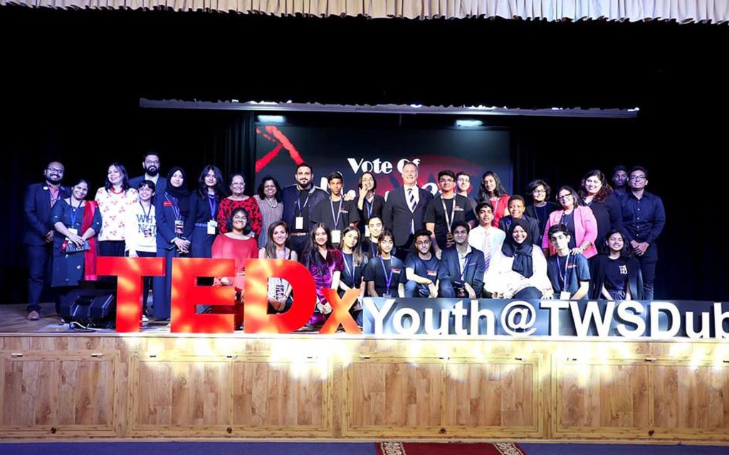Students of The Westminster School on the stage during a TEDx Youth event.