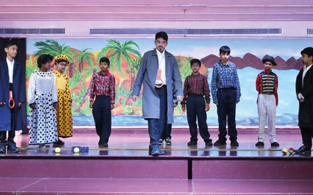 Students of Dubai Gem Private School performing on stage