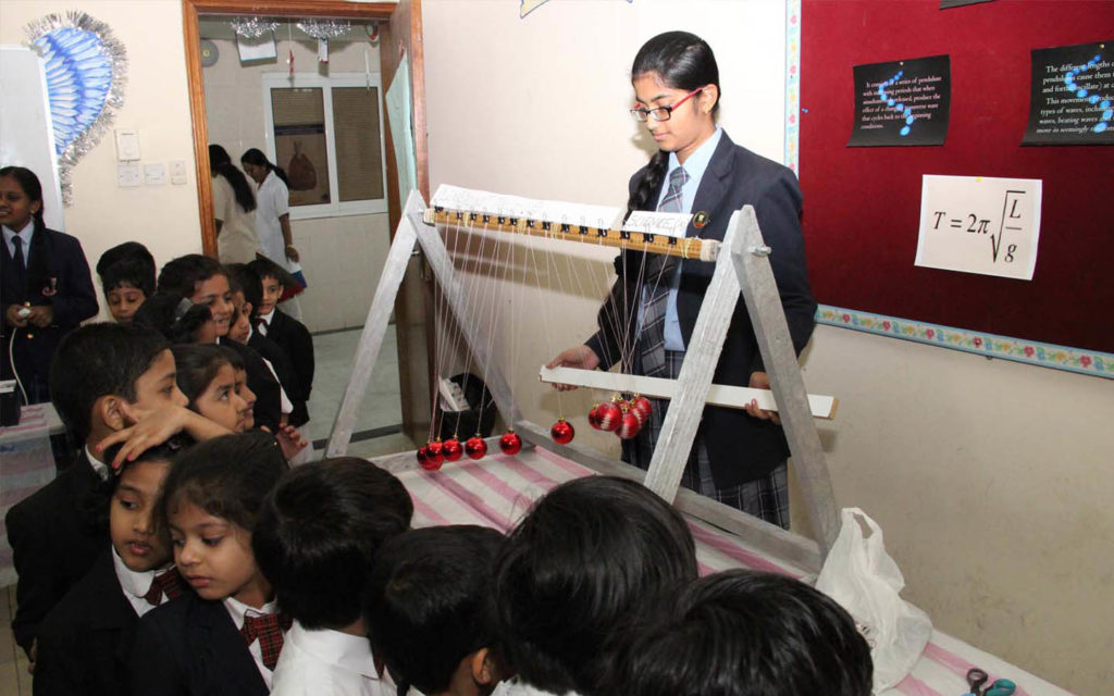 students understanding science experiments through the ENSECO programme at Emirates National School Sharjah