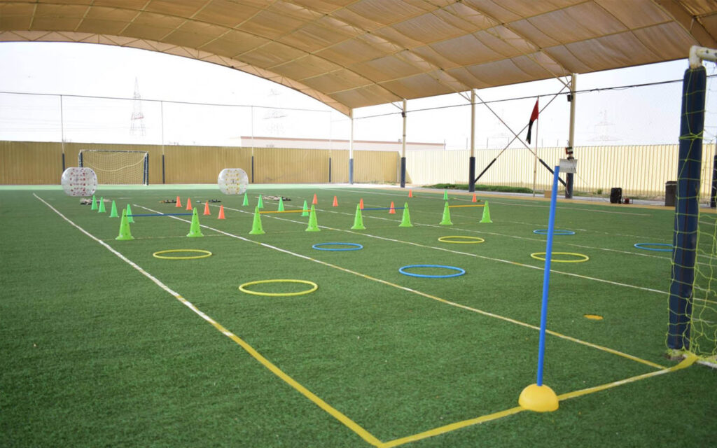 Outdoor football field at Al Resalah American International School